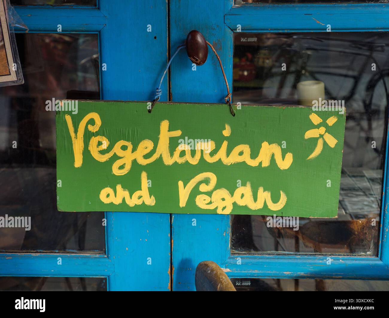 Sign outside vegetarian and vegan cafe and restaurant in Camden Town, London, UK Stock Photo