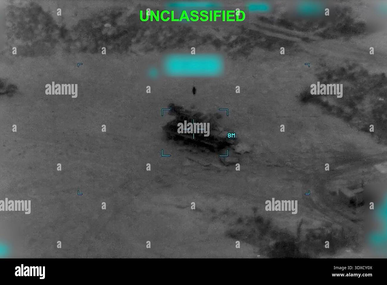 Partially Redacted This partially redacted image from video provided by U.S. Central ...