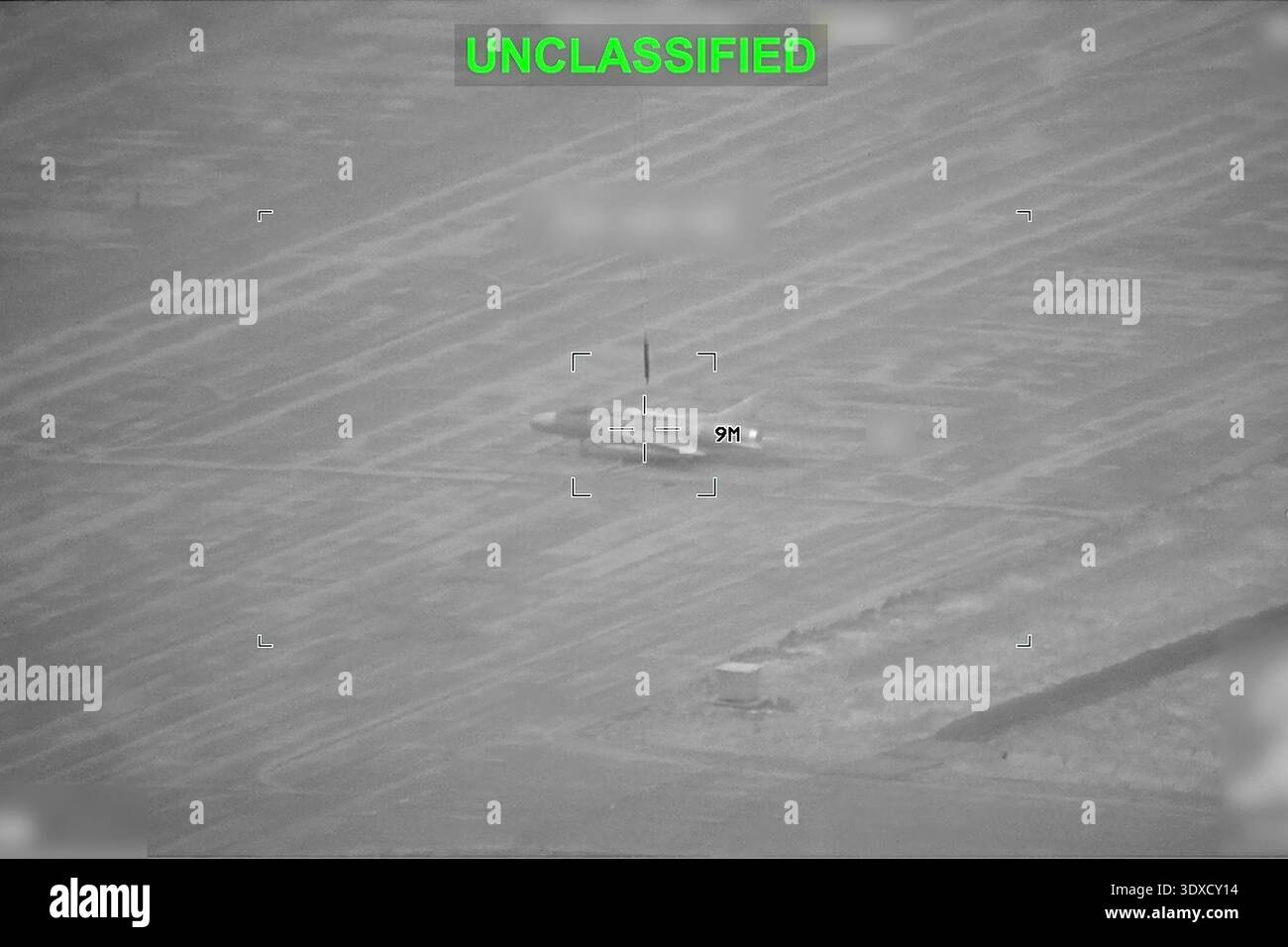 Partially Redacted This partially redacted image from video provided by U.S. Central ...