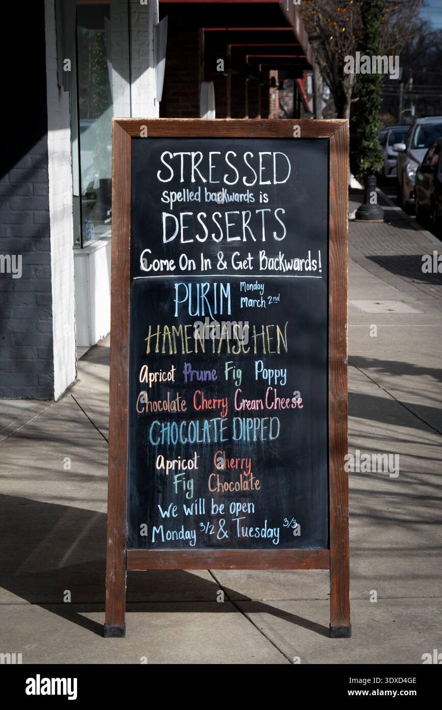 A funny sign outside Seth Greenberg's Just Desserts in Larchmont touting Purim holiday Hammentaschen. In Westchester, 2026. Stock Photo