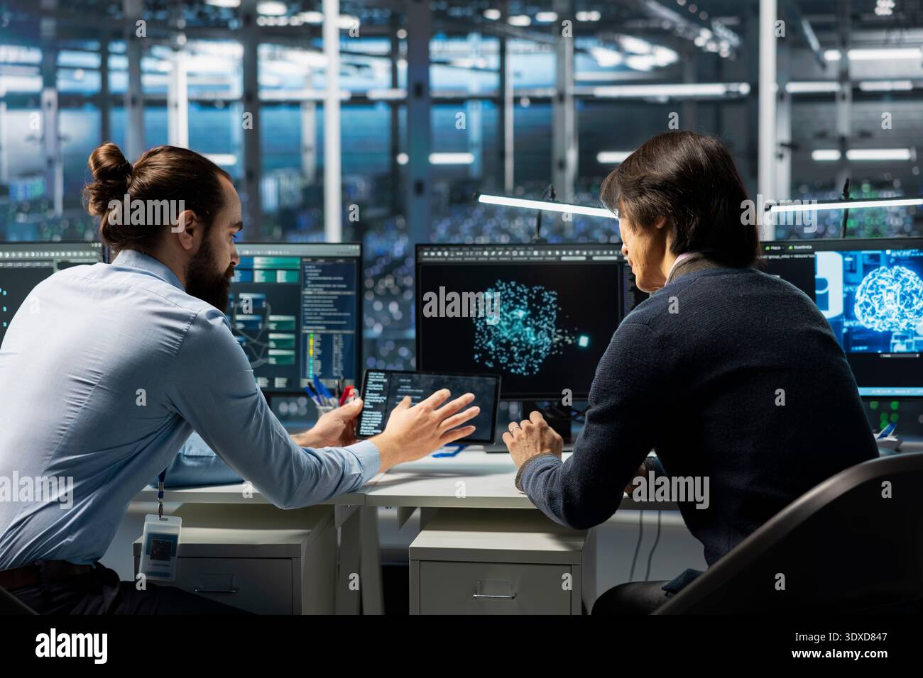 Technicians in data center installing upgraded server racks systems helped by AI technology. Server hub workers upgrading enterprise networks hardware using artificial intelligence Stock Photo
