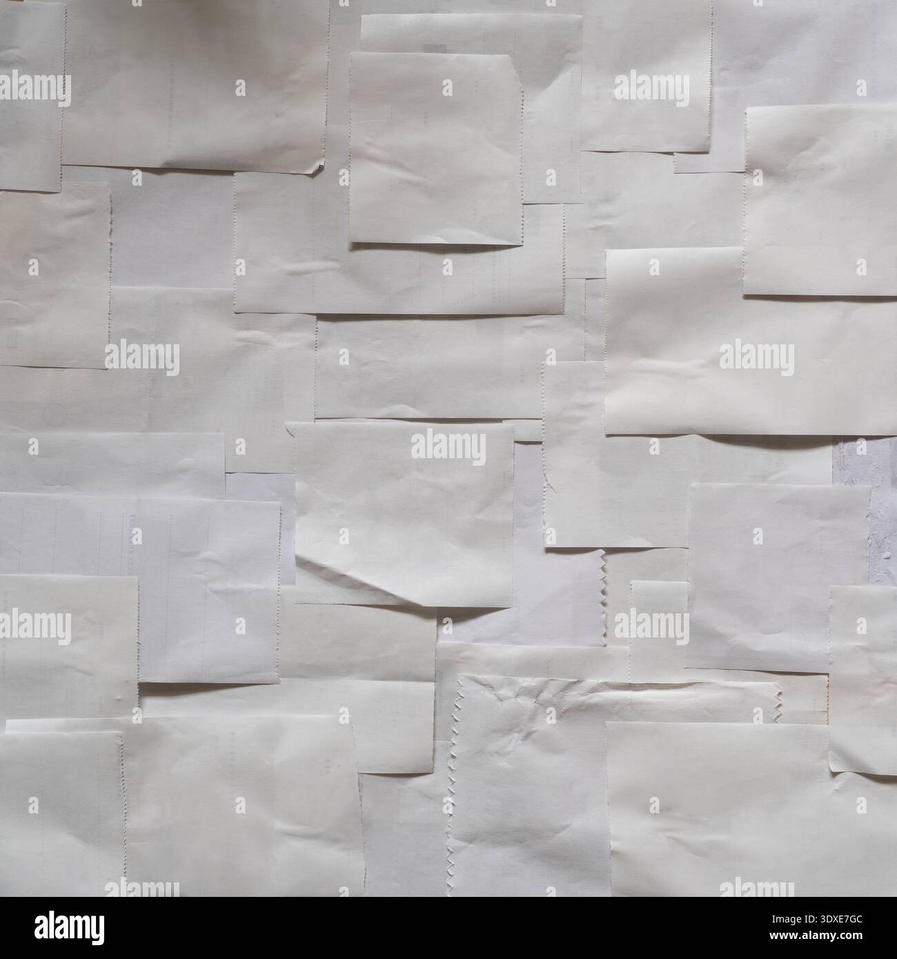 Grungy Background of Overlapping Old Store Receipts and Invoices Stock Photo