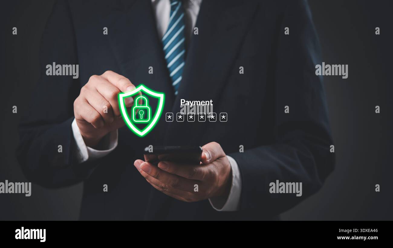 Businessman hand holding smartphone secure payment. Online banking security data protection technology. shield padlock password authentication. Cybers Stock Photo