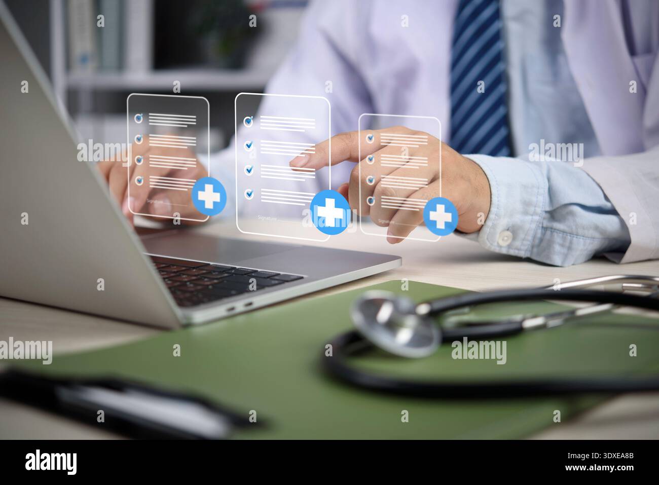 Doctor hands using laptop accessing electronic medical record system ...