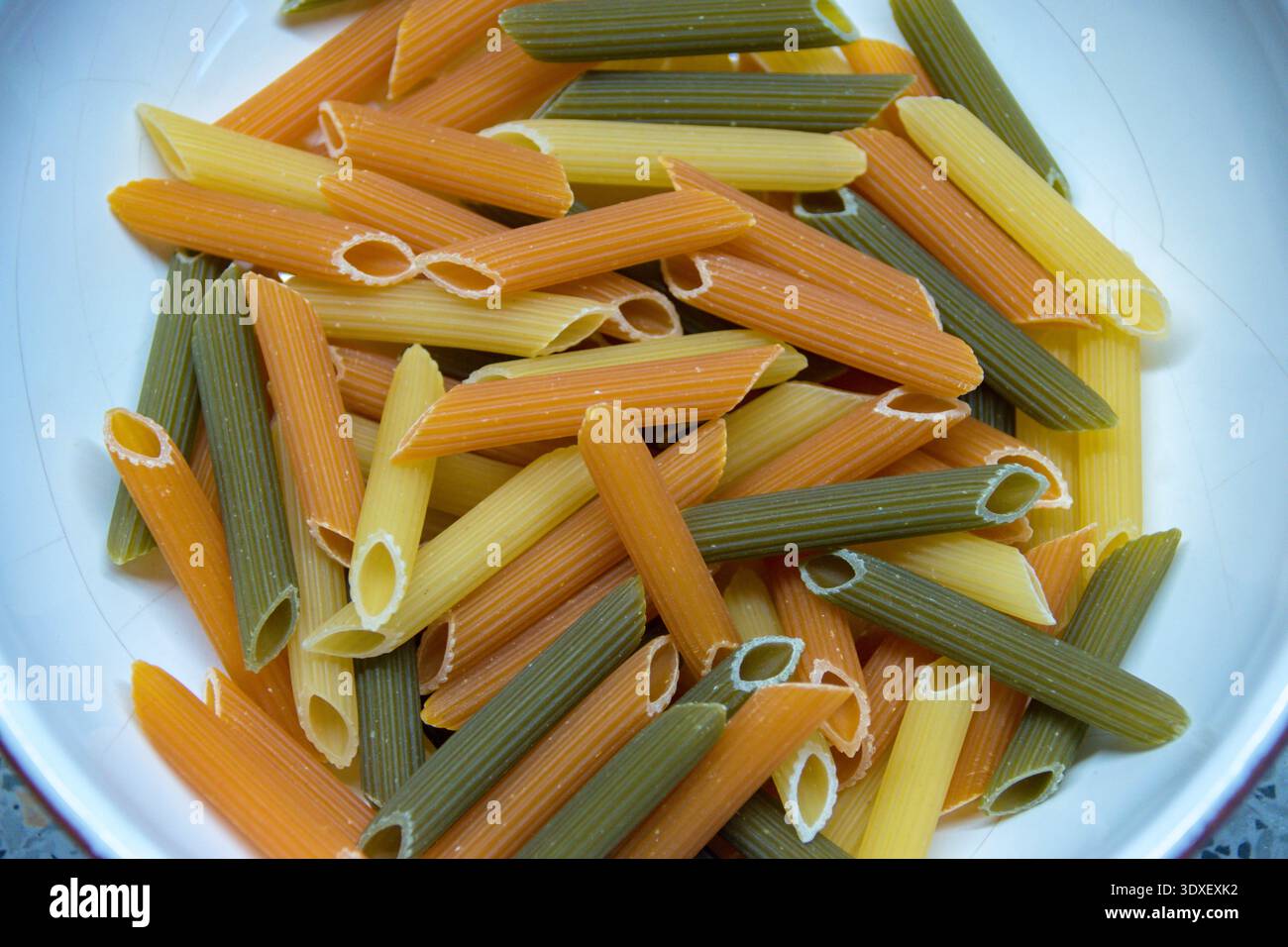Tri color pasta noddles close up. Stock Photo