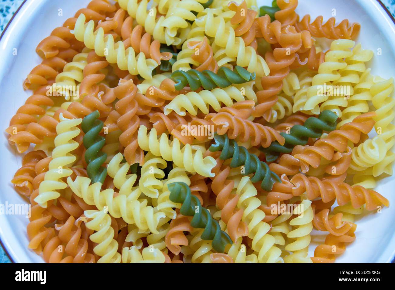 Tri color pasta noddles close up. Stock Photo