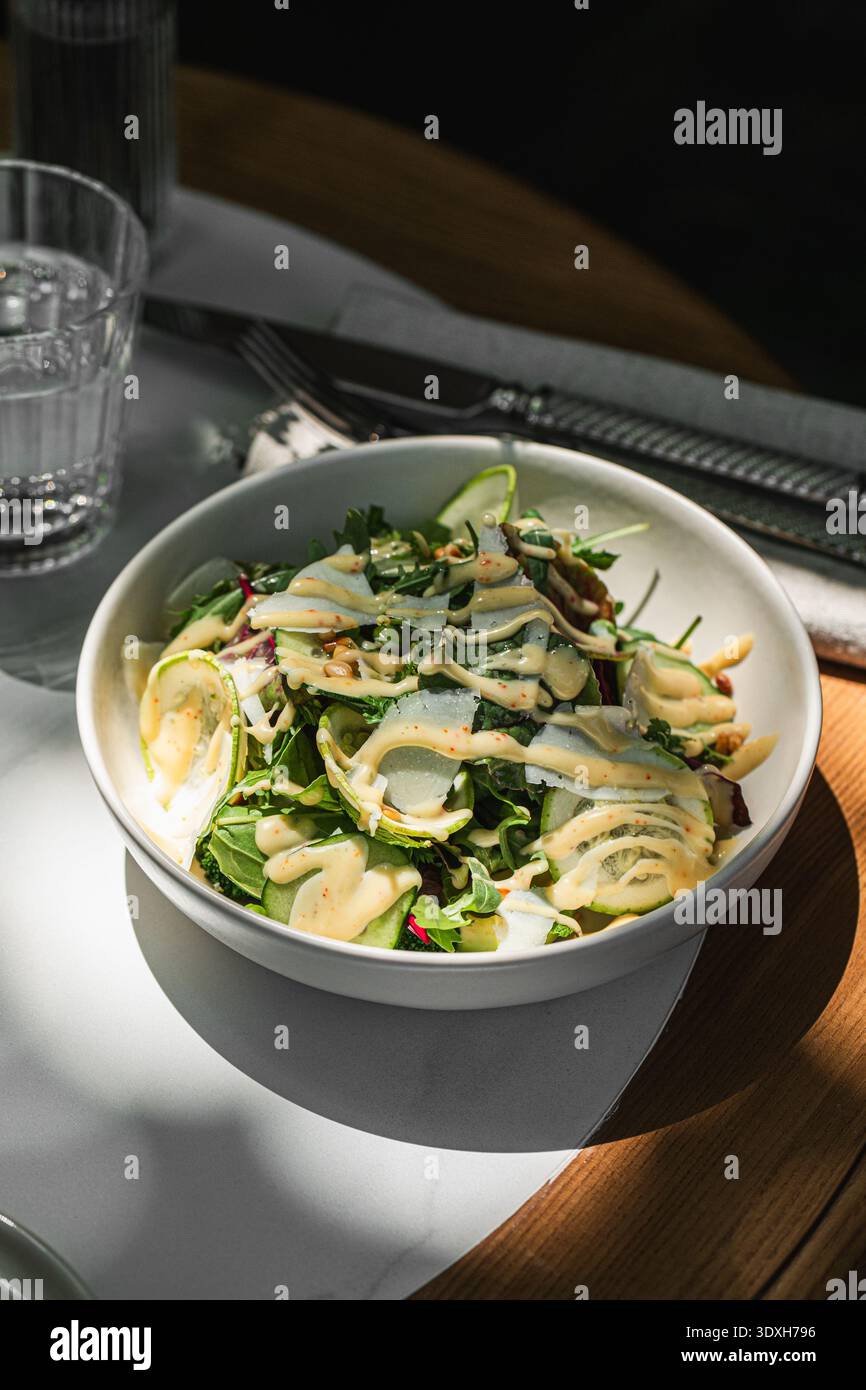 Fresh green salad with shaved zucchini Stock Photo