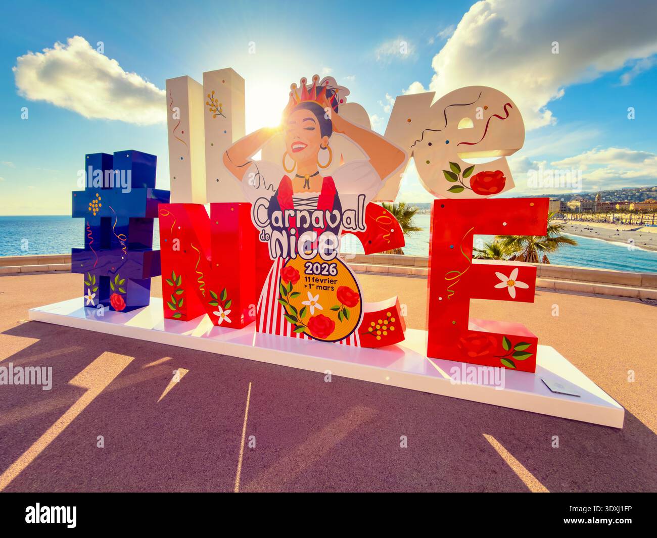 I Love Nice Sign and Nice Carnaval Special Edition During Golden Hour in Glorious Sunshine – Promenade des Anglais, Nice, Côte d’Azur, France - Smartphone Captured Stock Image