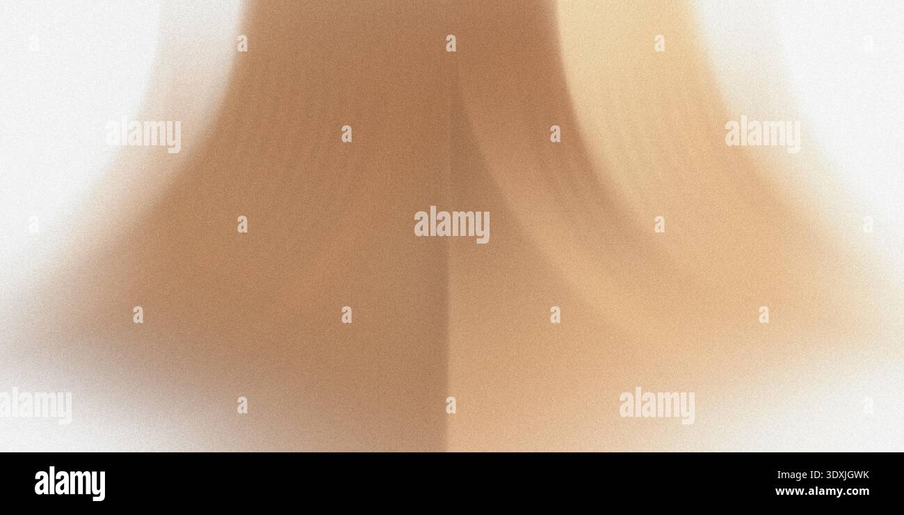 Abstract blurred image featuring two contrasting light brown tones with a soft and smooth transition Stock Photo
