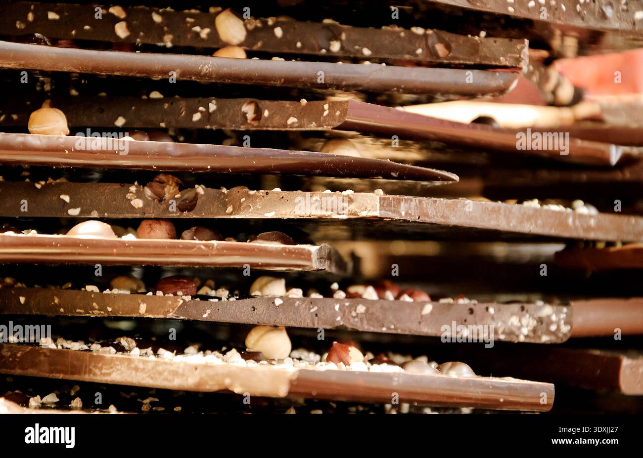 Dark chocolate with hazelnuts . Stock Photo