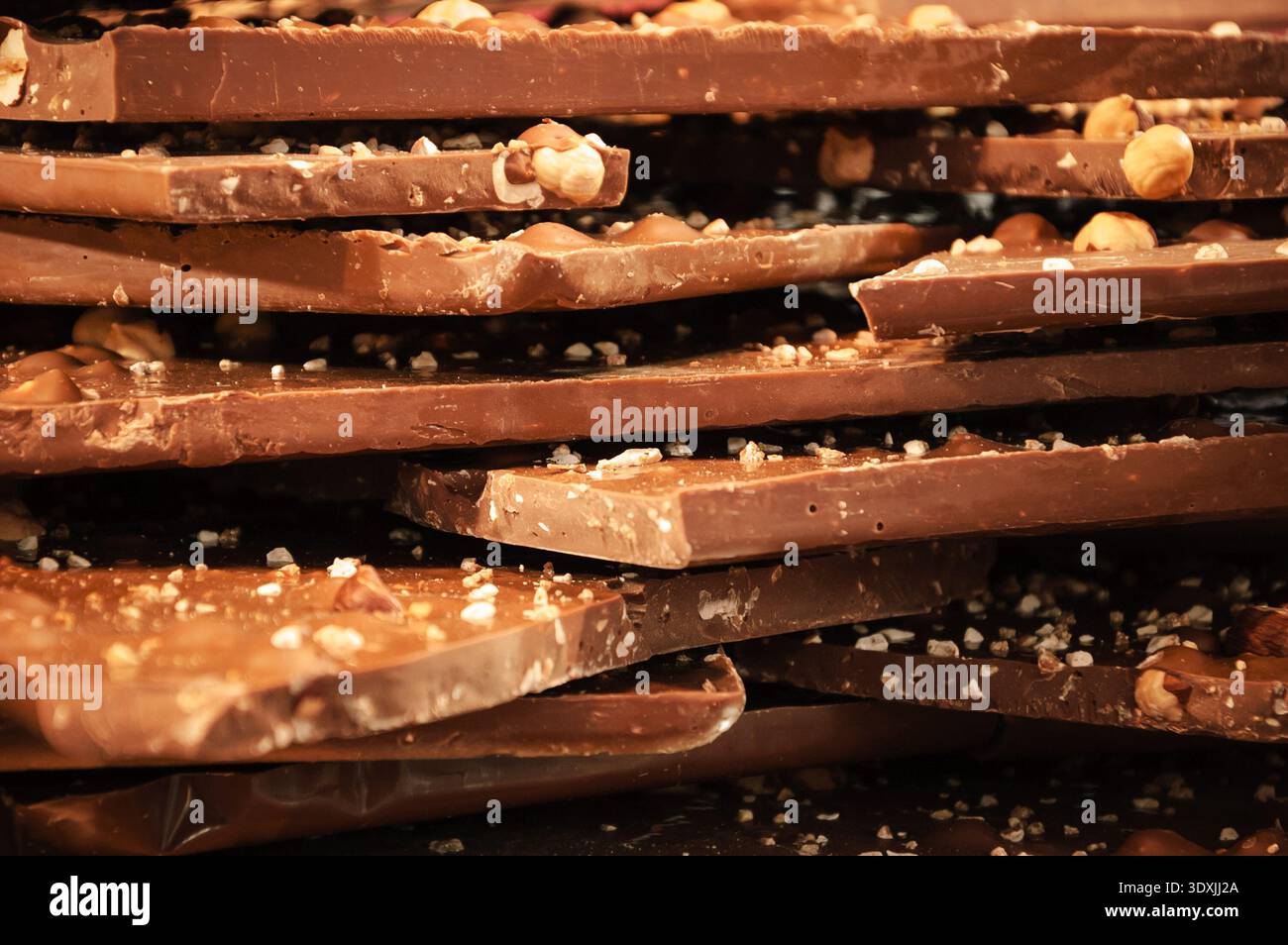 Milk chocolate with hazelnuts . Stock Photo