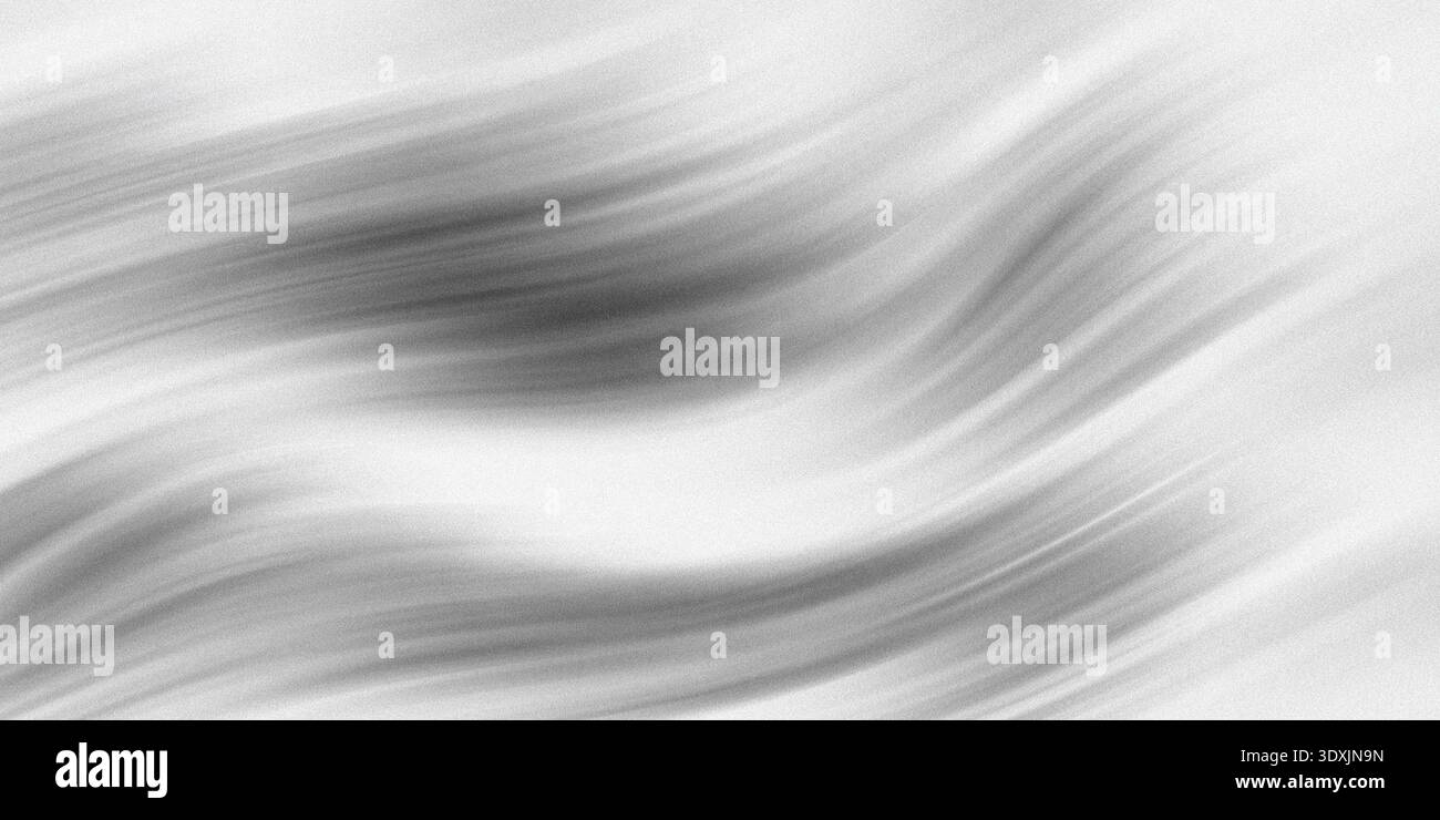 Abstract blurred grayscale image featuring flowing lines and soft gradients of light and shadow Stock Photo
