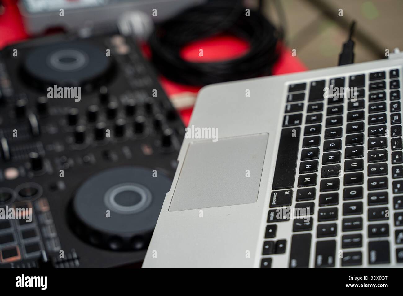 Close up of DJ controller and laptop setup. Stock Photo