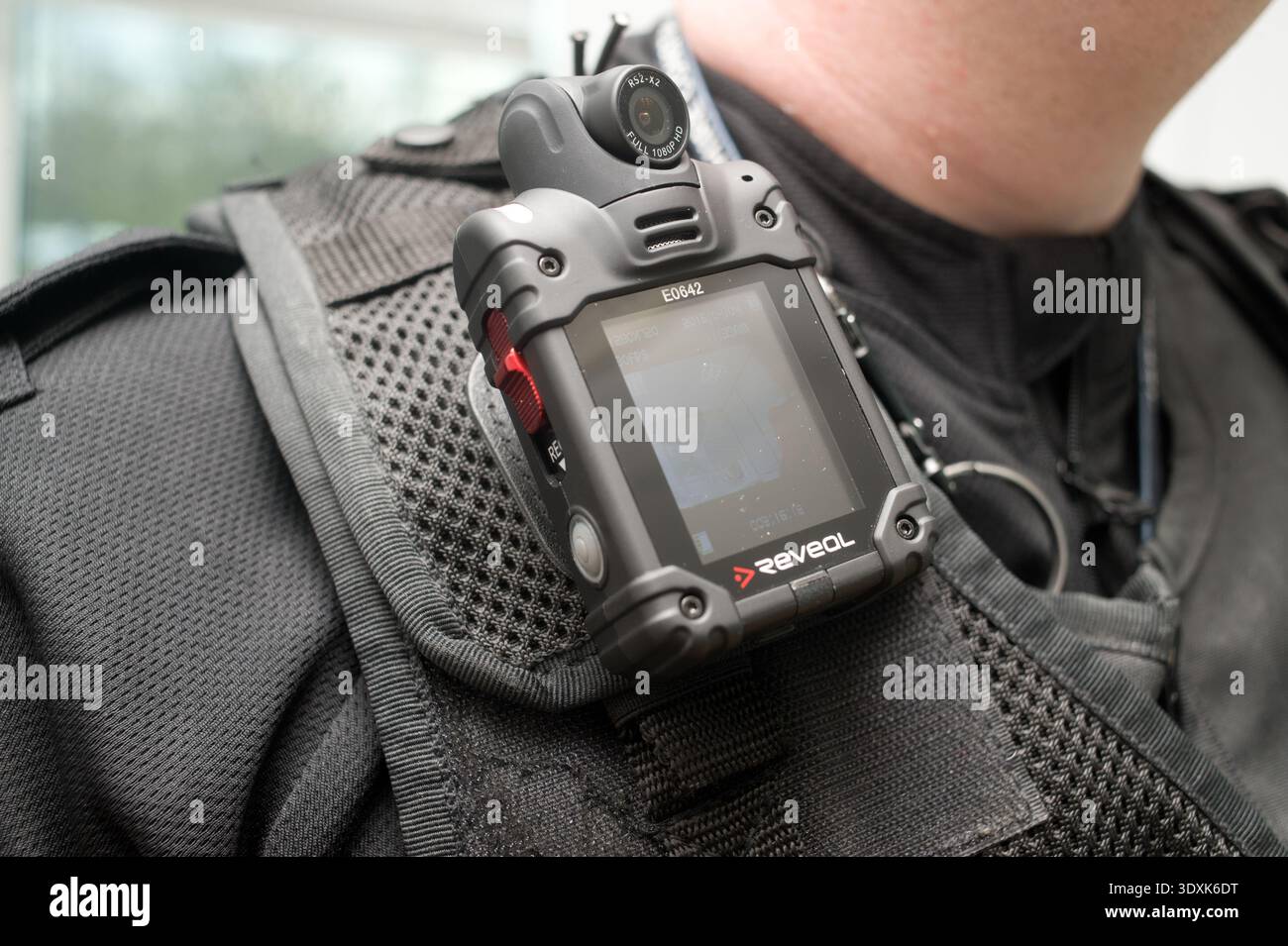 A British police officer is equipped with a Reveal body-worn high ...