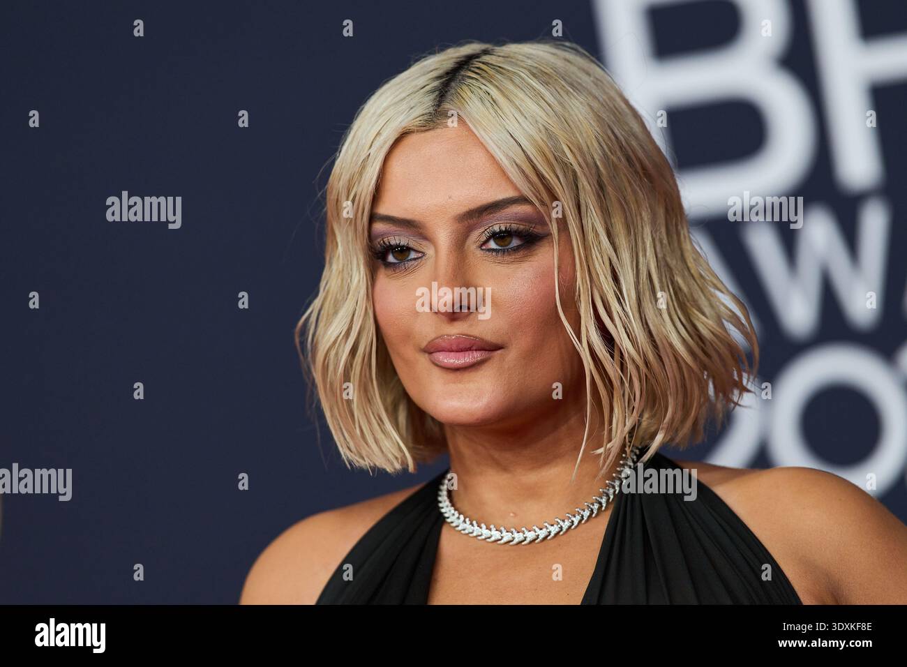 Bebe Rexha poses for photographers upon arrivals during the Brit Awards ...