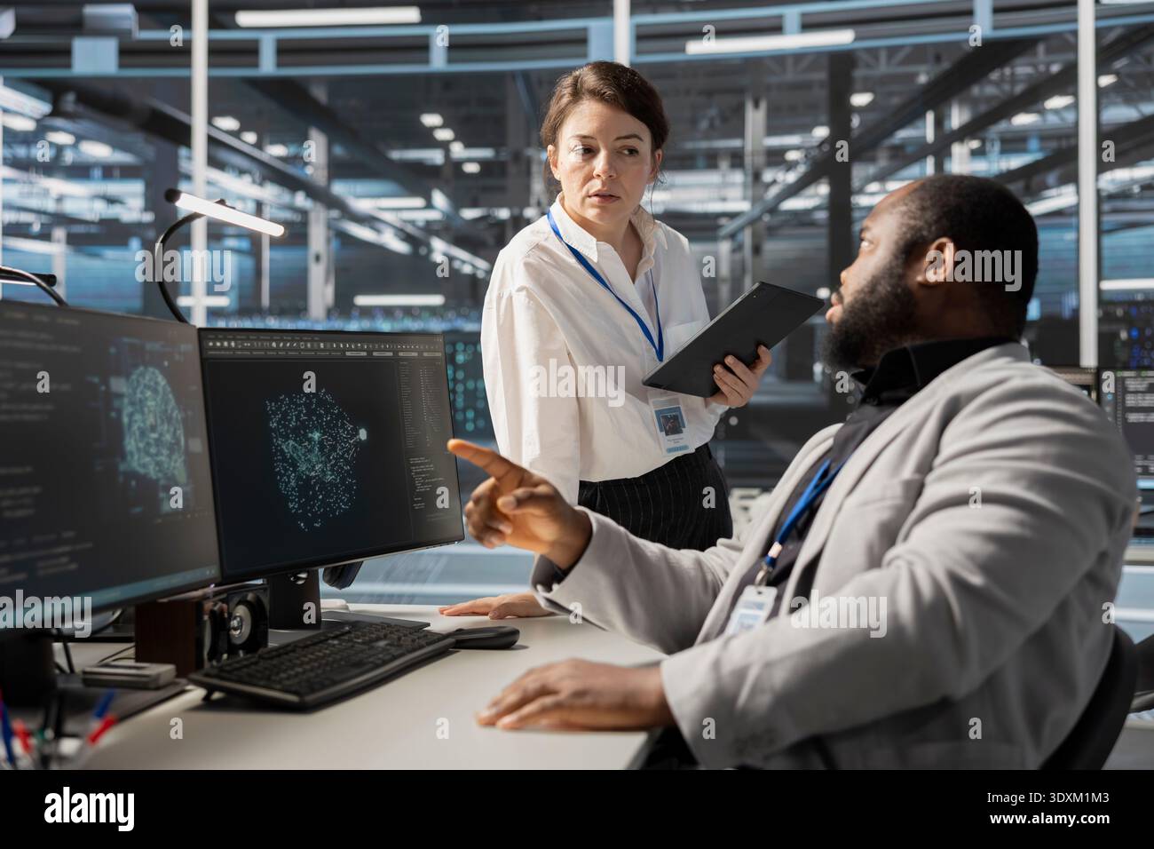 Data center software developers use AI visualization tool to optimize resource allocation. Server hub engineering team uses artificial intelligence analysis on computer to do maintenance Stock Photo