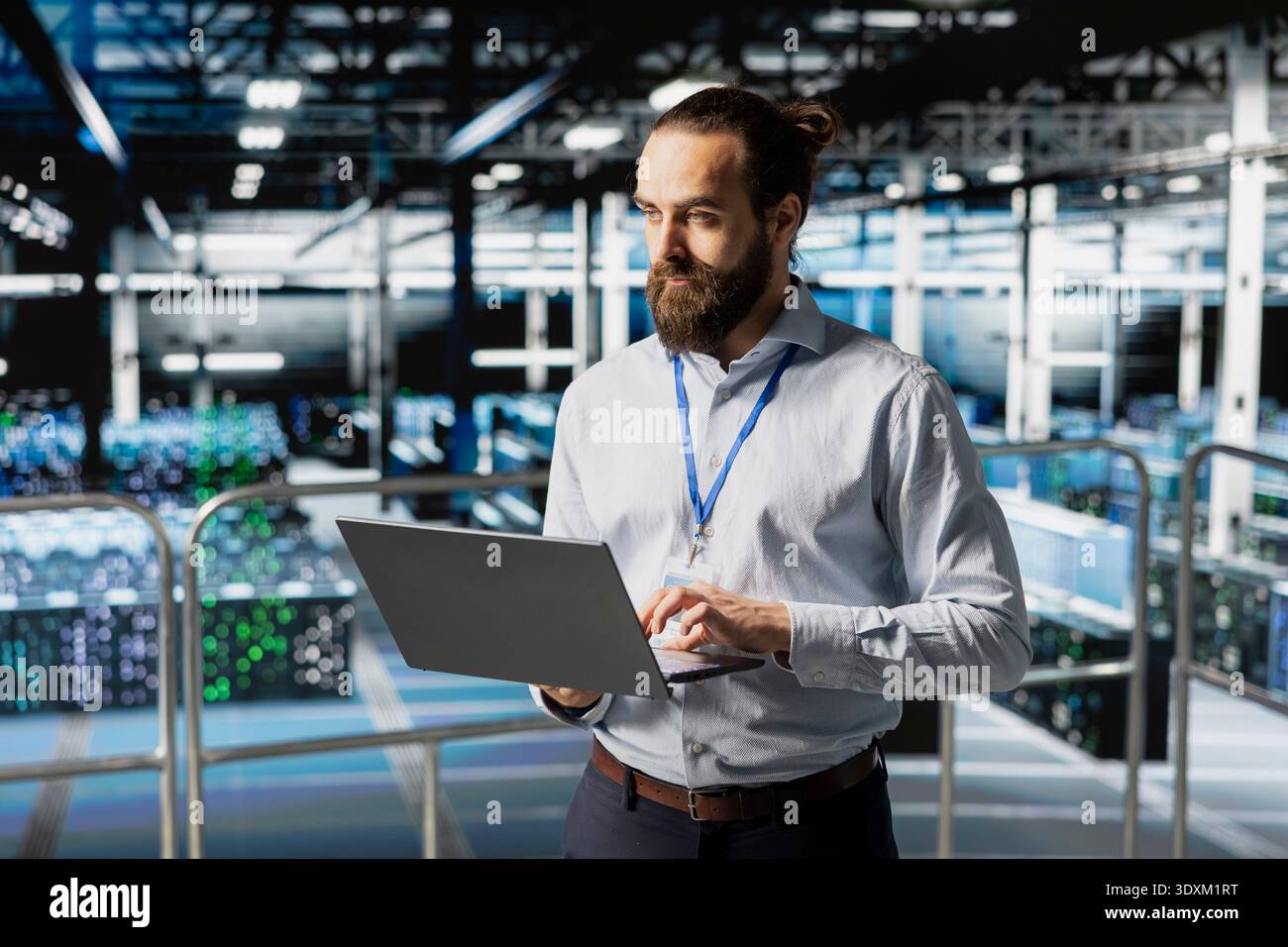 Software developer reviews data management for server rigs with tablet, handling AI processing tasks on industrial platform. Worker managing machine learning technology for development. Stock Photo