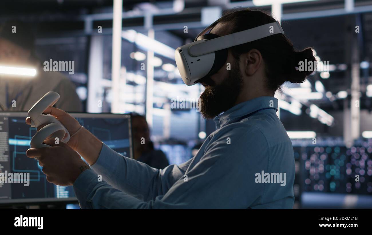 Data center employee wearing VR headset using artificial intelligence neural networks technology. Server farm programmer using AI programming language and virtual reality to update hardware, camera A Stock Photo
