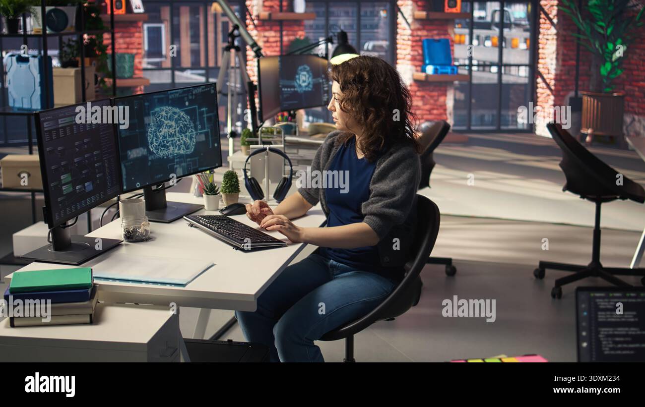 IT expert writing code and debugging on artificial intelligence neural networks computerized brain model. Woman tech support doing checkup on AI systems, cloud computing. Camera A. Stock Photo