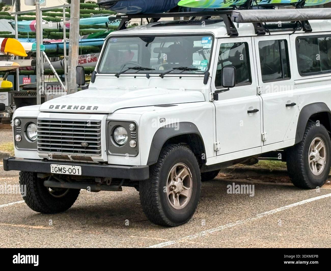 2015 model white Land Rover Defender 4WD vehicle parked in Sydney, Australia - Smartphone Captured Stock Image