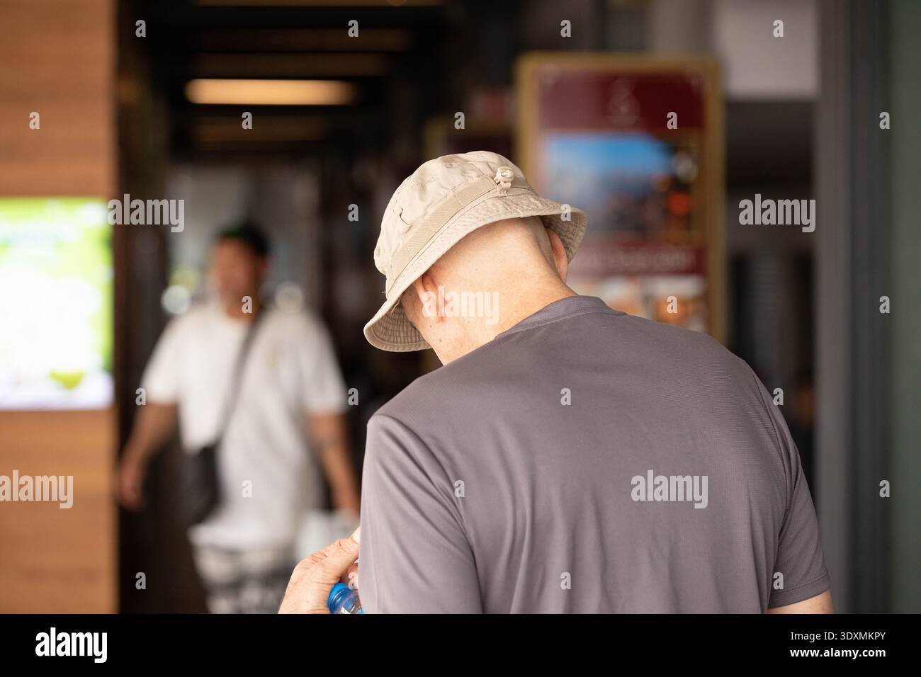 Bald man rear view hat hi-res stock photography and images - Alamy
