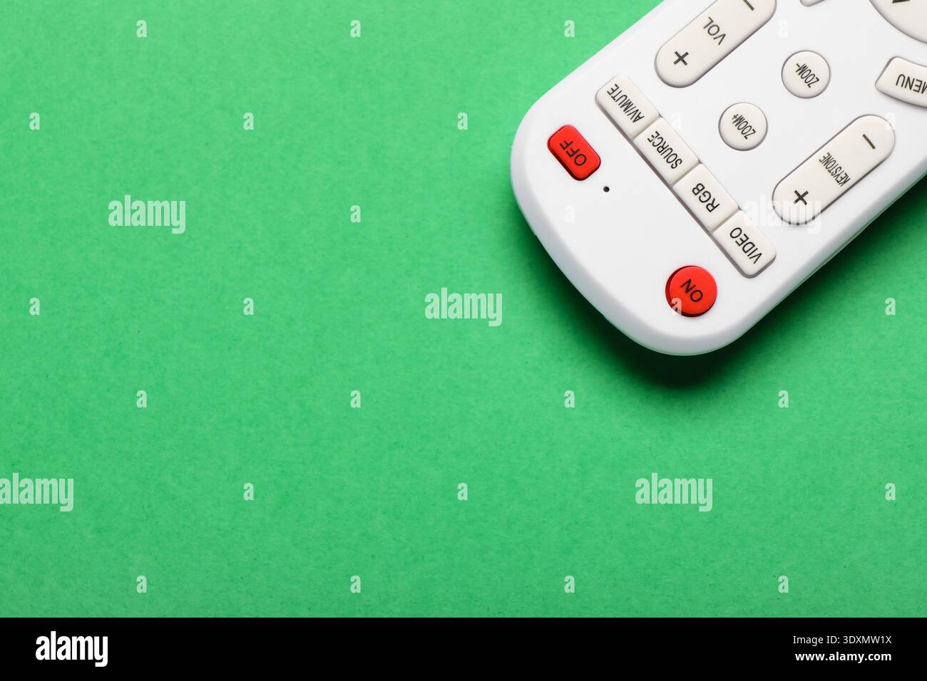 TV remote controller on green background Stock Photo
