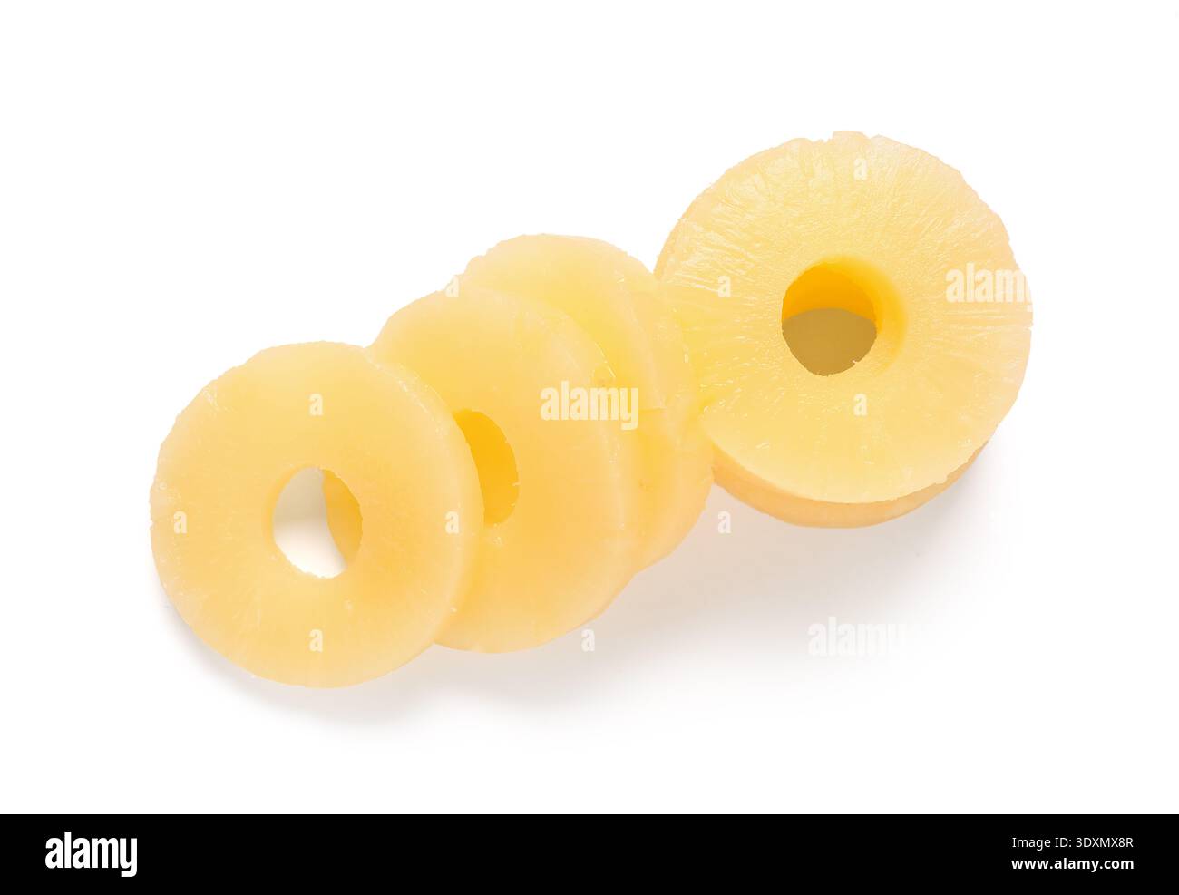 Canned pineapple rings on white background Stock Photo