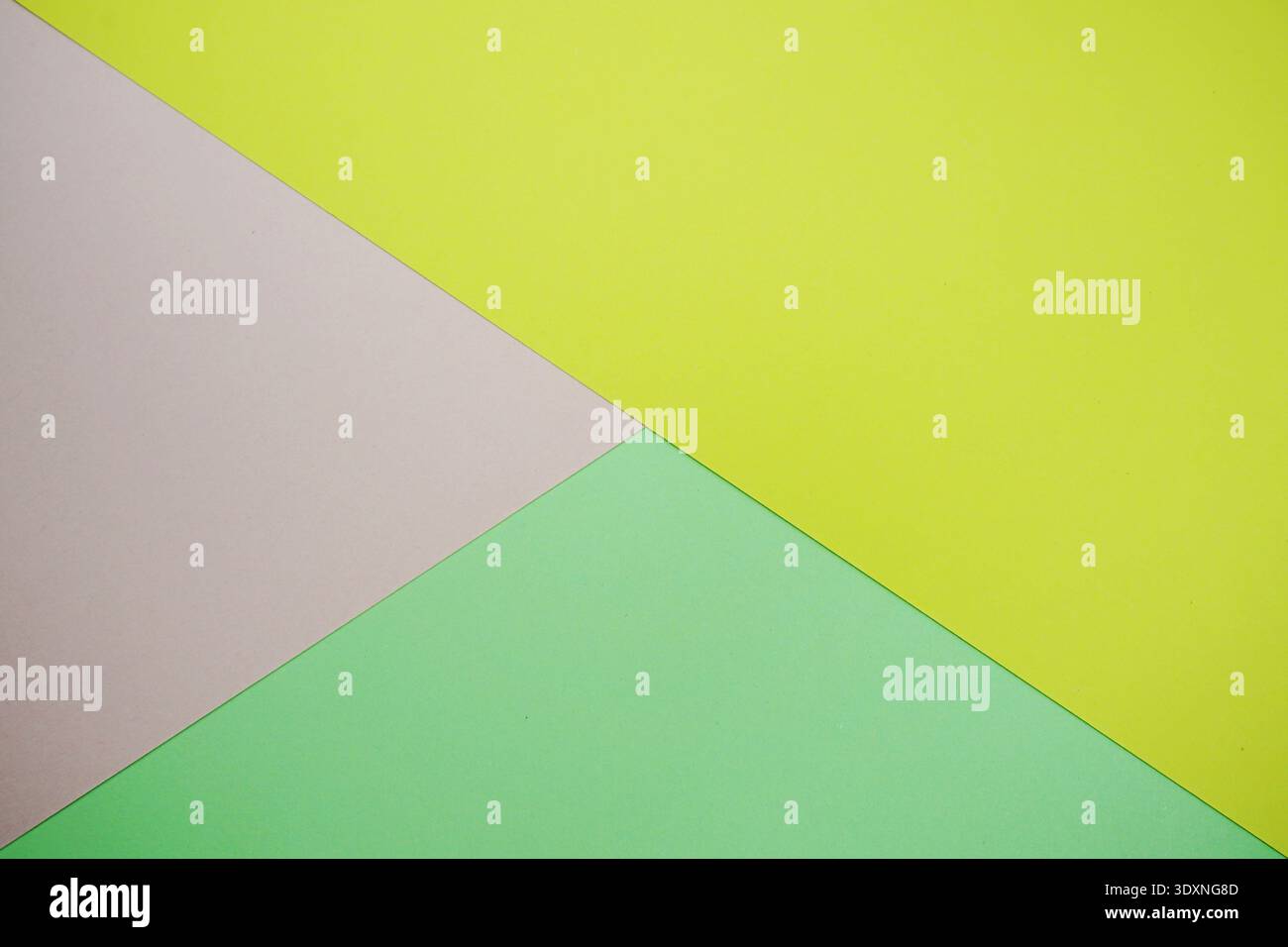 A minimal abstract image featuring intersecting geometric triangles in soft pastel color Stock Photo