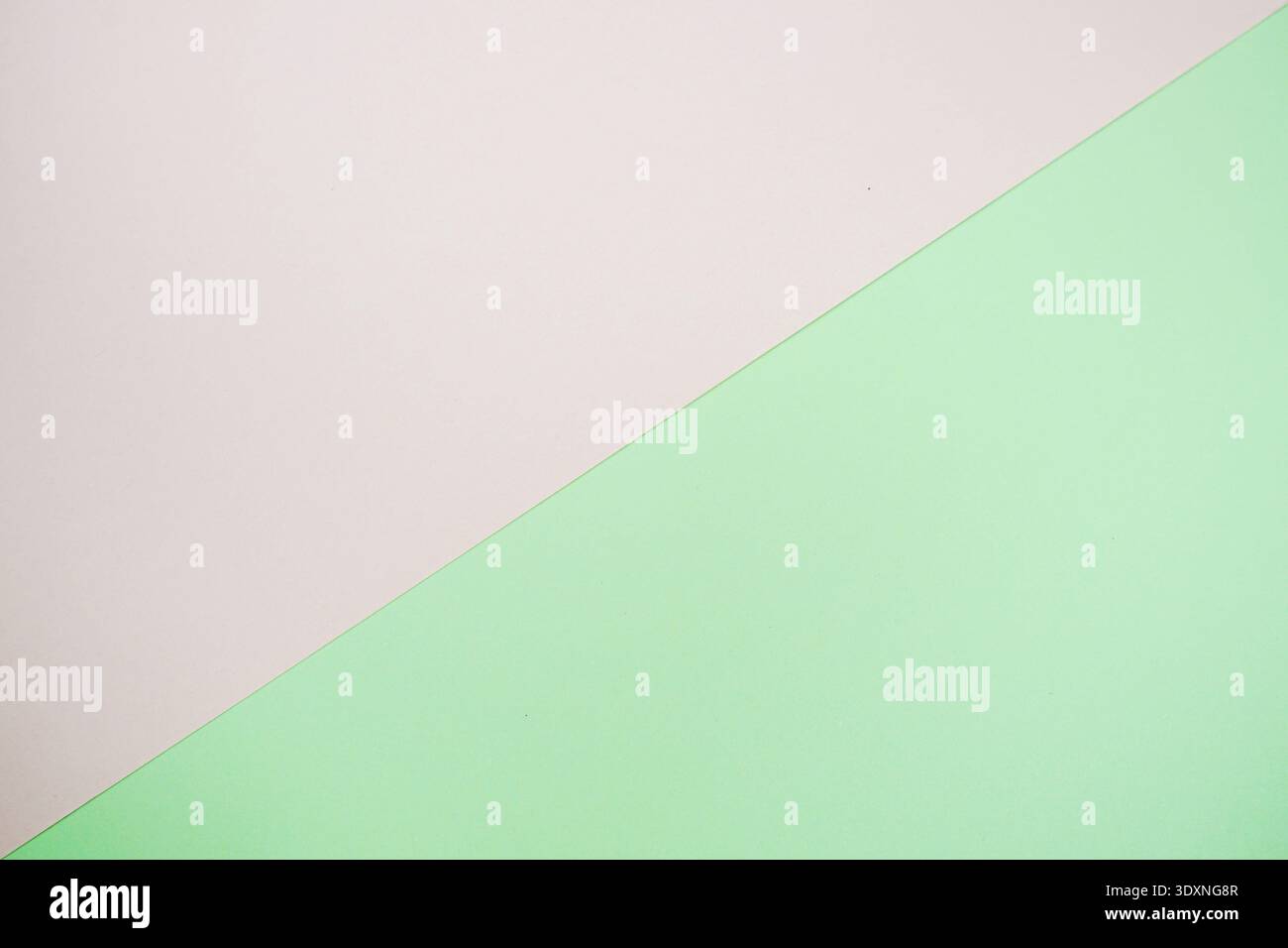 A minimal abstract image featuring intersecting geometric triangles in soft pastel color Stock Photo
