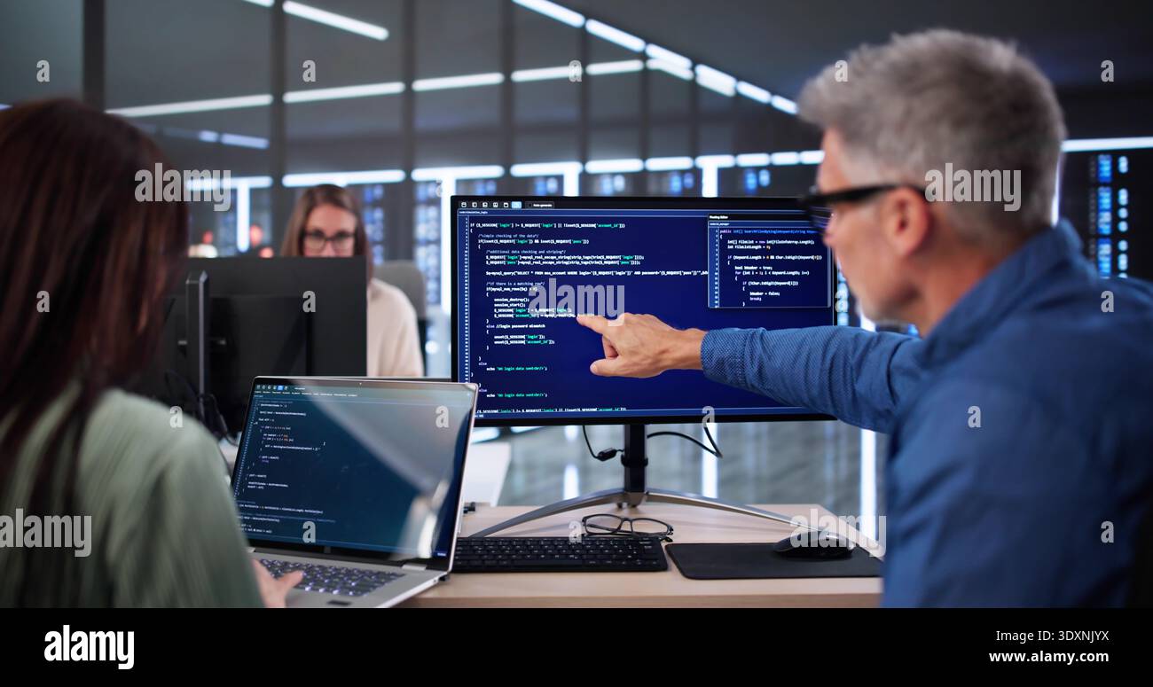 Secure Cyber Business Code Training With Developers In Office Environment Stock Photo