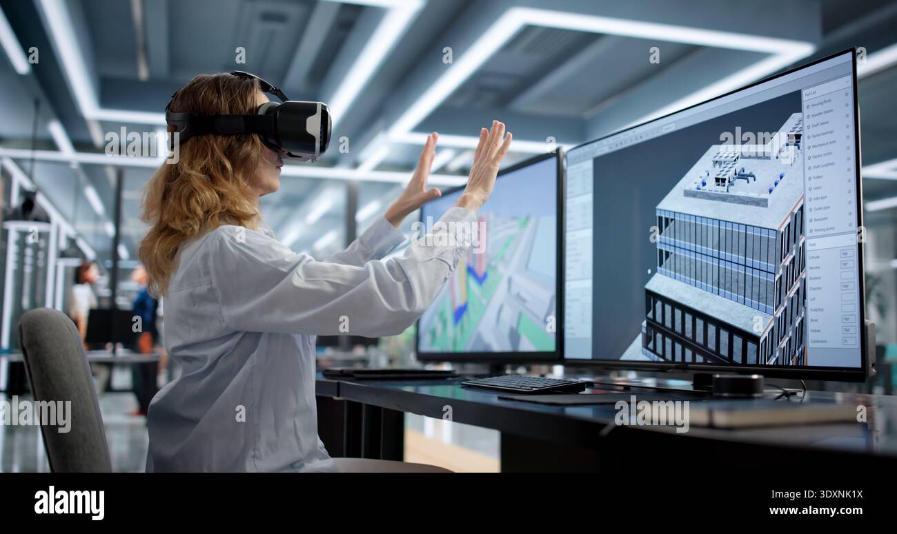 Woman Wearing VR Headset Creates 3D Model For Architectural Project. Stock Photo