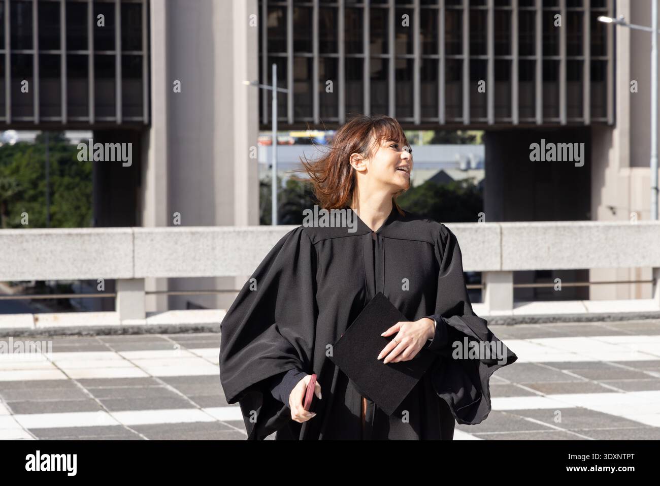 Asian female standing in plaza hi-res stock photography and images - Alamy