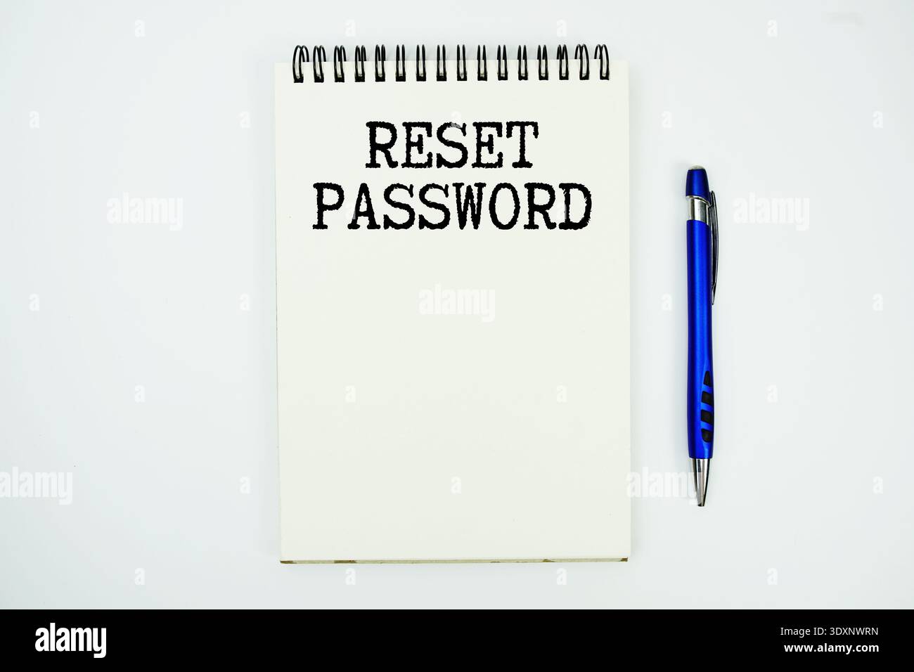 Reset Password message written on notepad with pen on white background Stock Photo