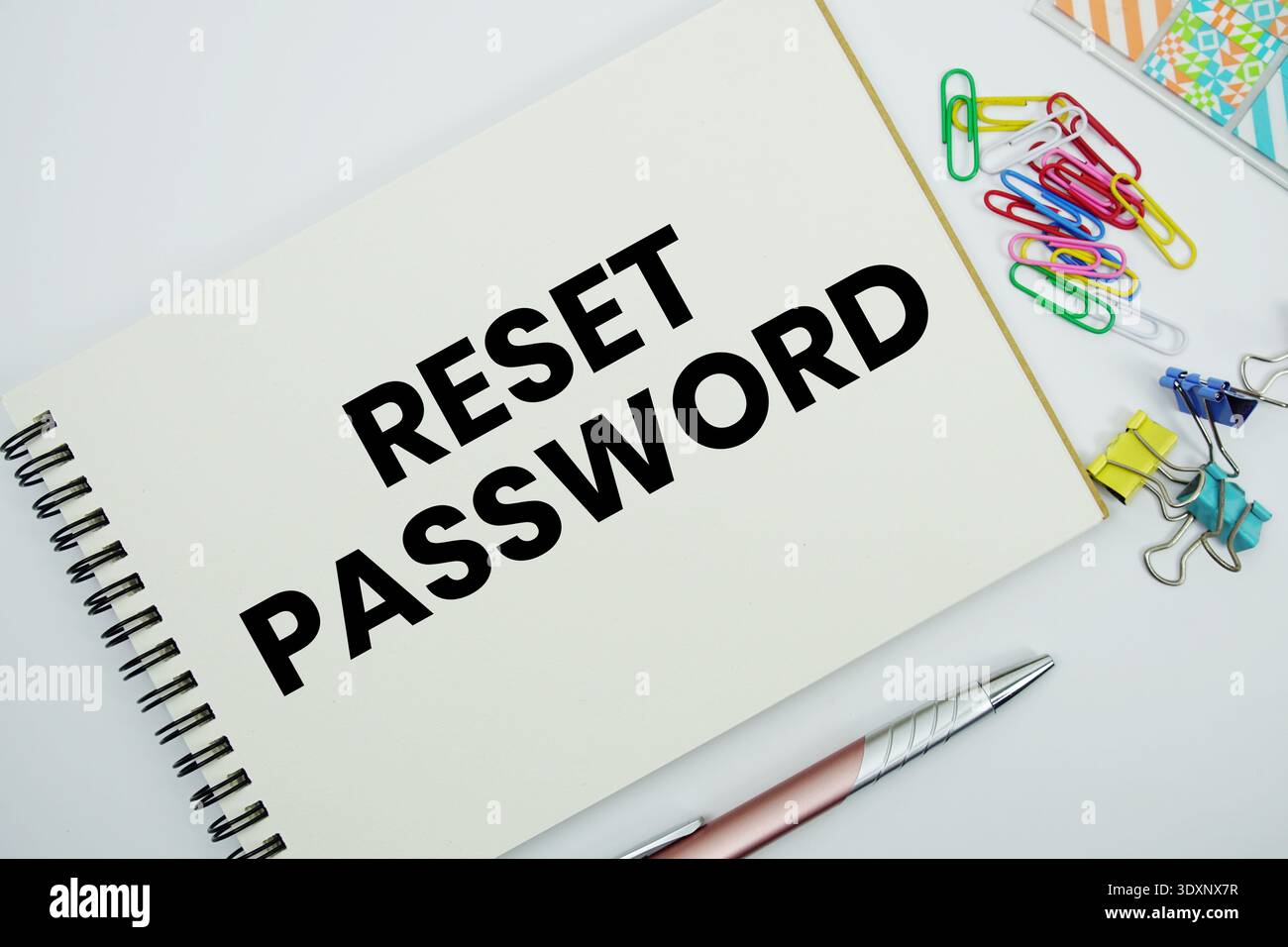 Reset Password text message written on notepad with stationery flat lay on white background Stock Photo