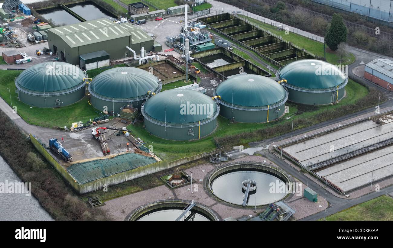 Aerial view of the water treatment plant with circular tanks and ...