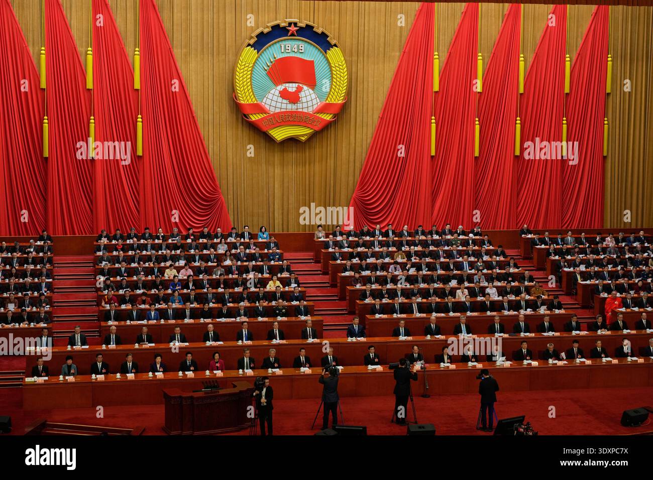 Chinese officials including Chinese President Xi Jinping attend the ...