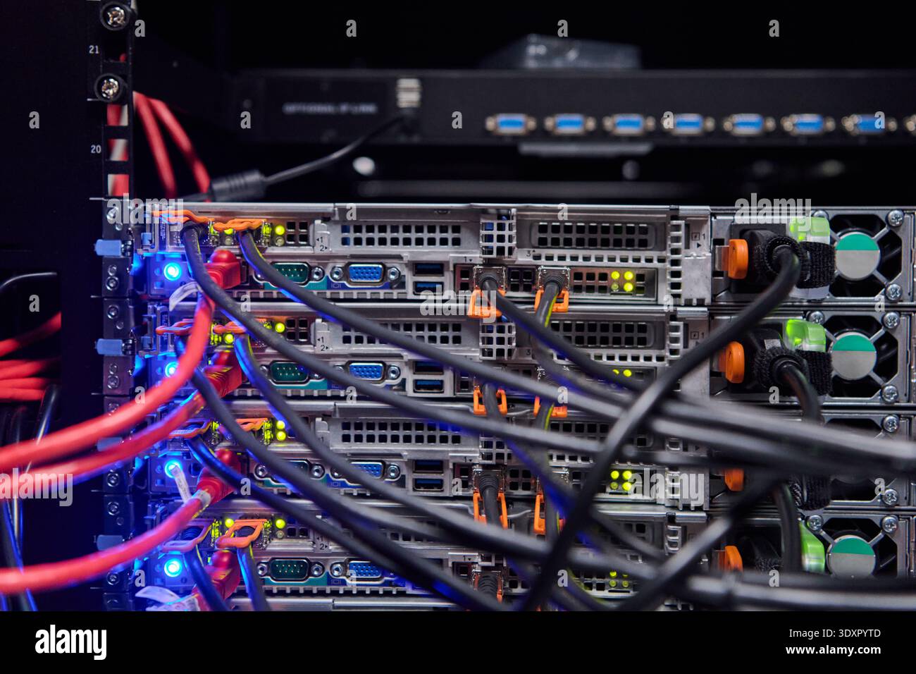 Server rack with network cables and blinking status lights in a modern ...