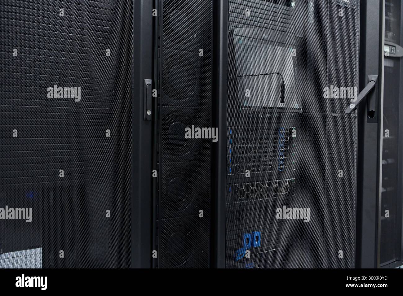 Server rack and network equipment inside a secure data center cabinet ...
