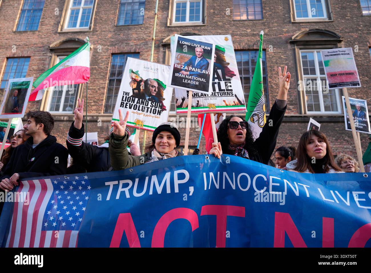 Sample Rally Placards People demonstrate showing placards of Iran's exiled crown prince Reza ...