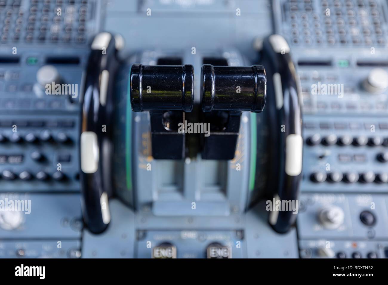 Pilot Engine Lever Close-up view of engine throttle levers inside commercial airplane ...