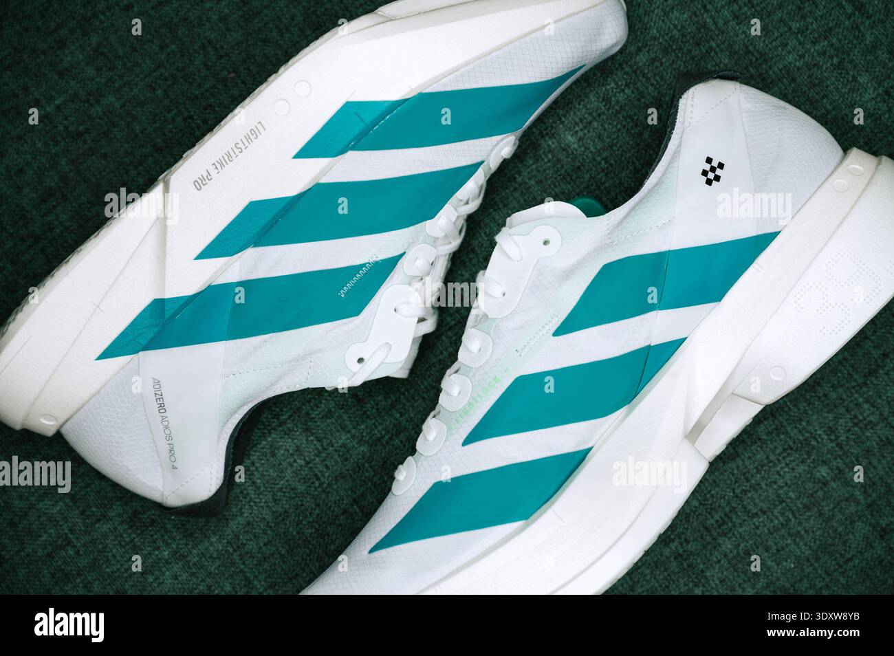 adidas gazelle silver green womens Adidas ADIZERO EVO SL EXO Cloud White Core Black – Kicks Machine main image 0
