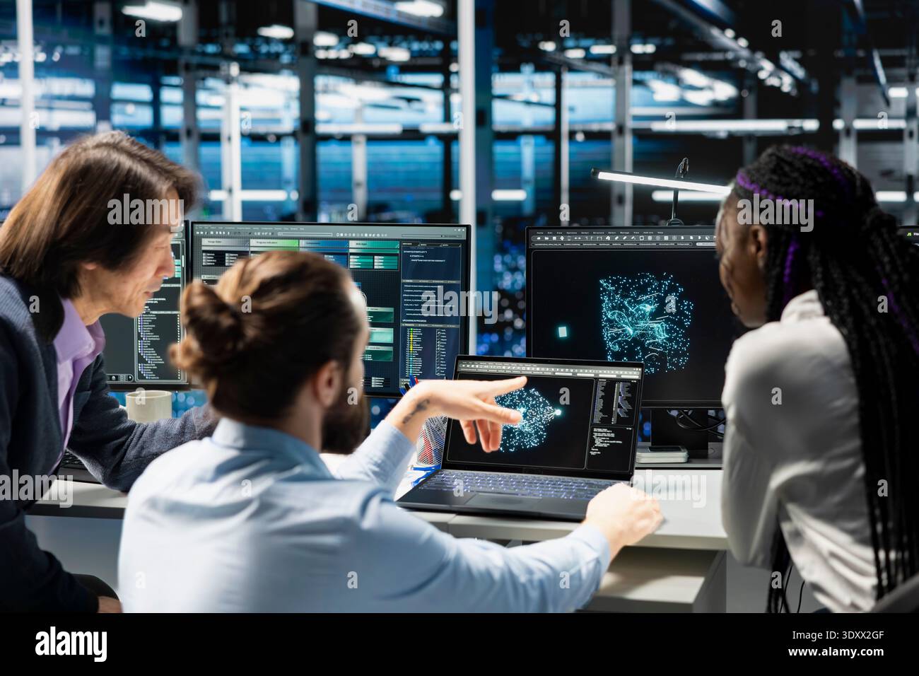 Team of programmers doing brainstorming in data center, optimizing equipment for AI tasks, increasing workloads. Coworkers cooperating in server hub, automating system diagnostics using deep learning Stock Photo