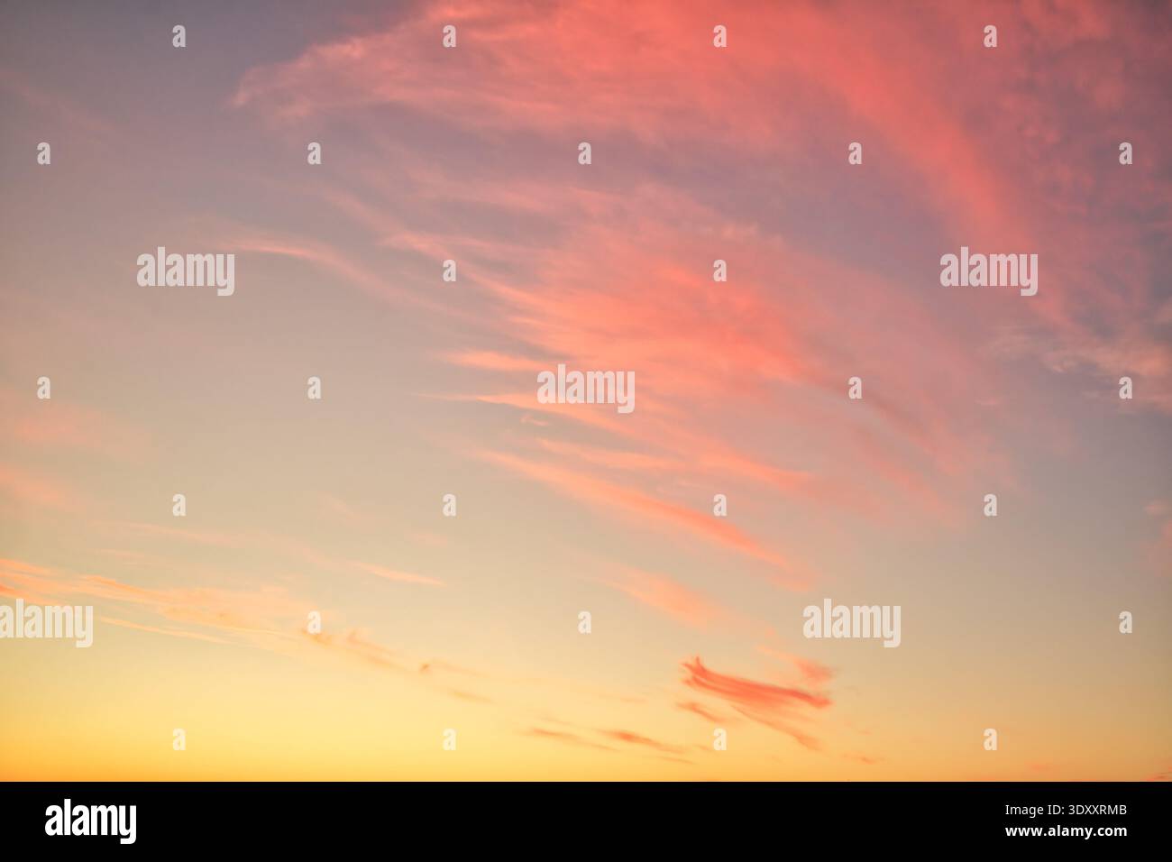 Wonderful New Zealand sky replacement after sunset sky of warmth and some red clouds Stock Photo