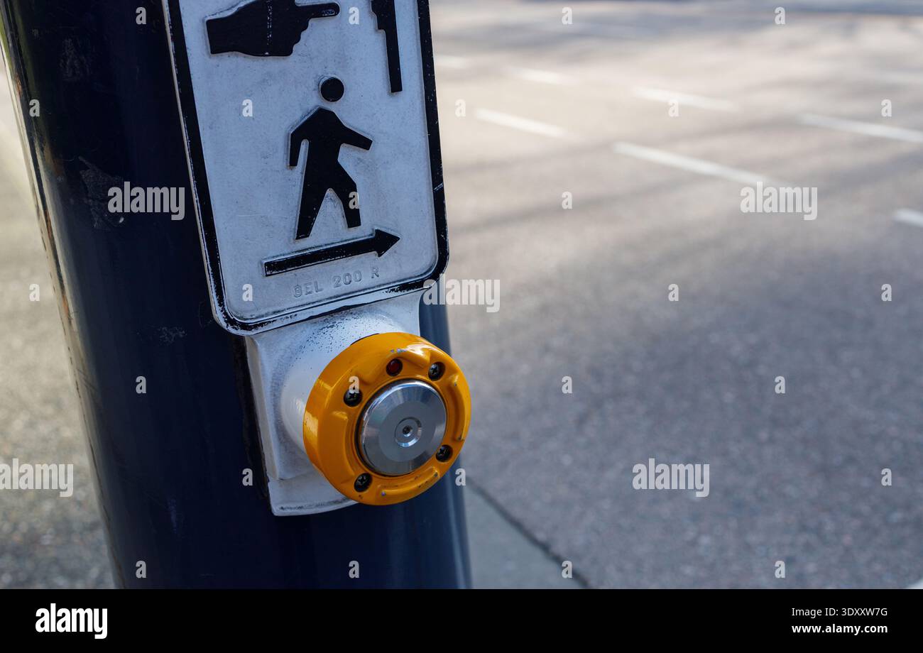 Pedestrian crossing button with yellow push mechanism and directional ...