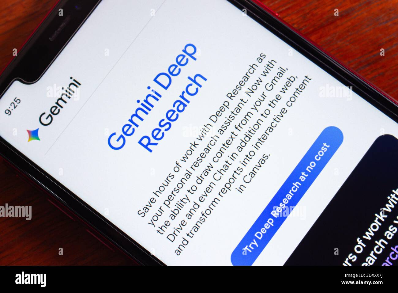 Smartphone screen showing Gemini Deep Research interface, an AI-powered tool for advanced content analysis and contextual research support. Stock Photo