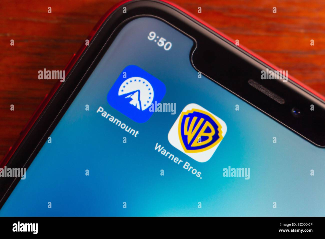 Close up of a smartphone screen showing Paramount and Warner Bros icons ...