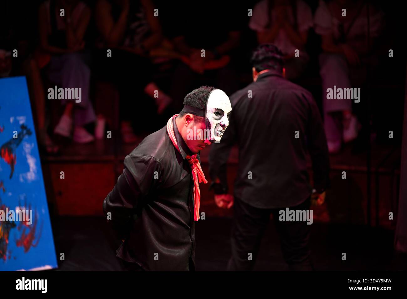 A circus performer represents a Khmer Rouge fighter at the Phare circus production of Sokha in Siem Reap, Cambodia. Stock Photo