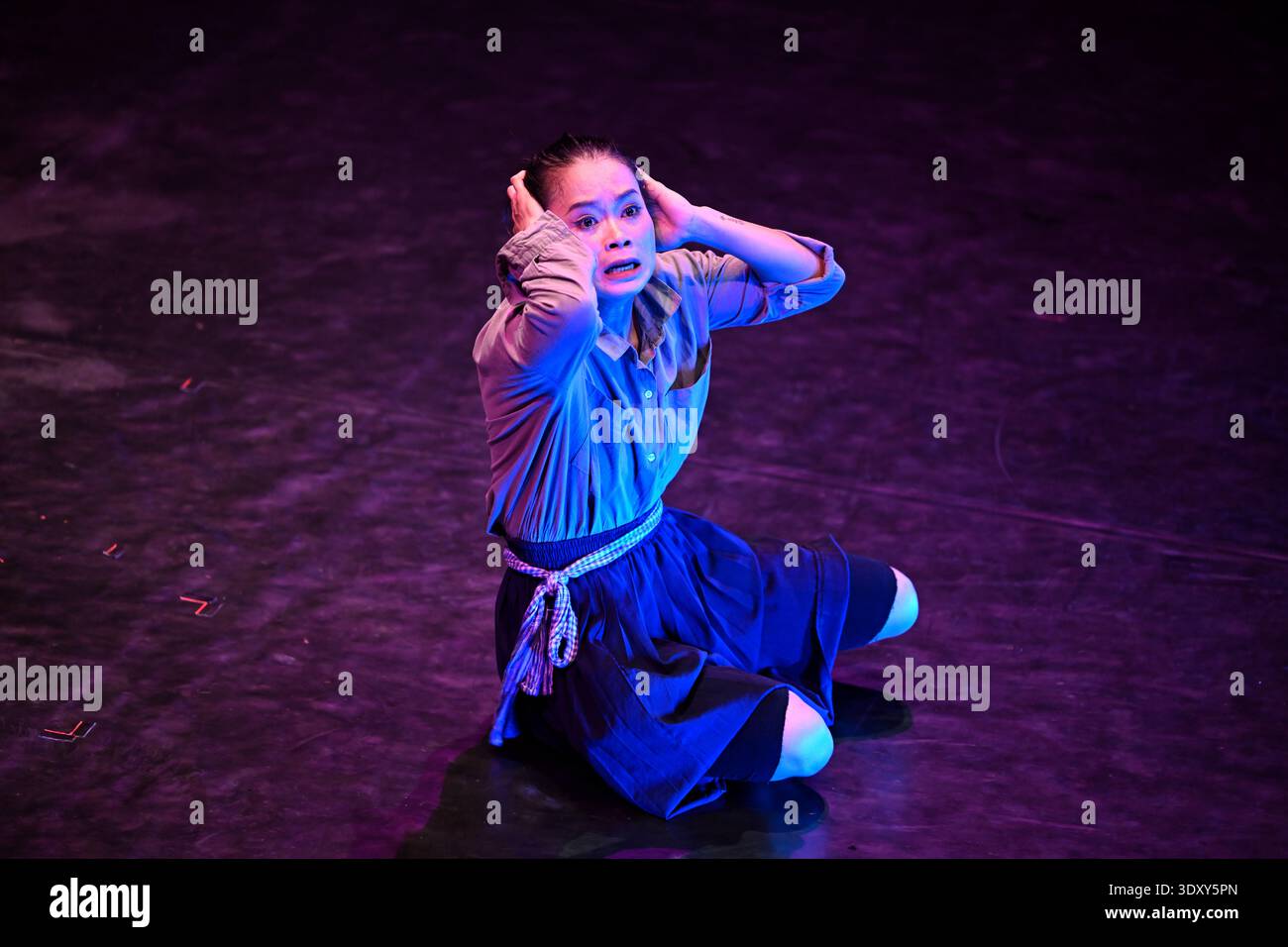 Lead character Sokha is haunted by childhood memories of the Khmer Rouge in the Phare circus show of the same name in Siem Reap, Cambodia. Stock Photo