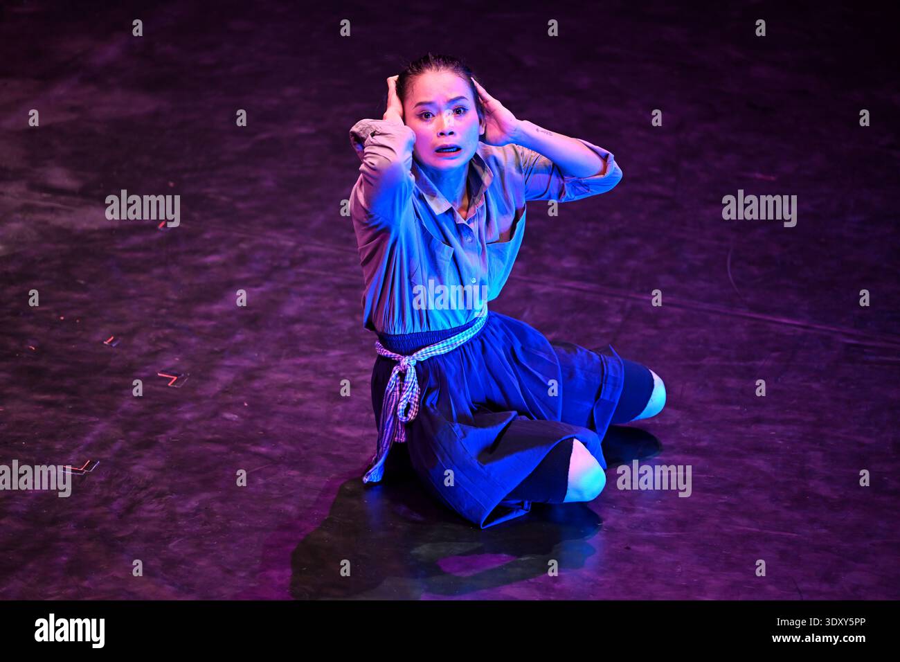 Lead character Sokha is haunted by childhood memories of the Khmer Rouge in the Phare circus show of the same name in Siem Reap, Cambodia. Stock Photo