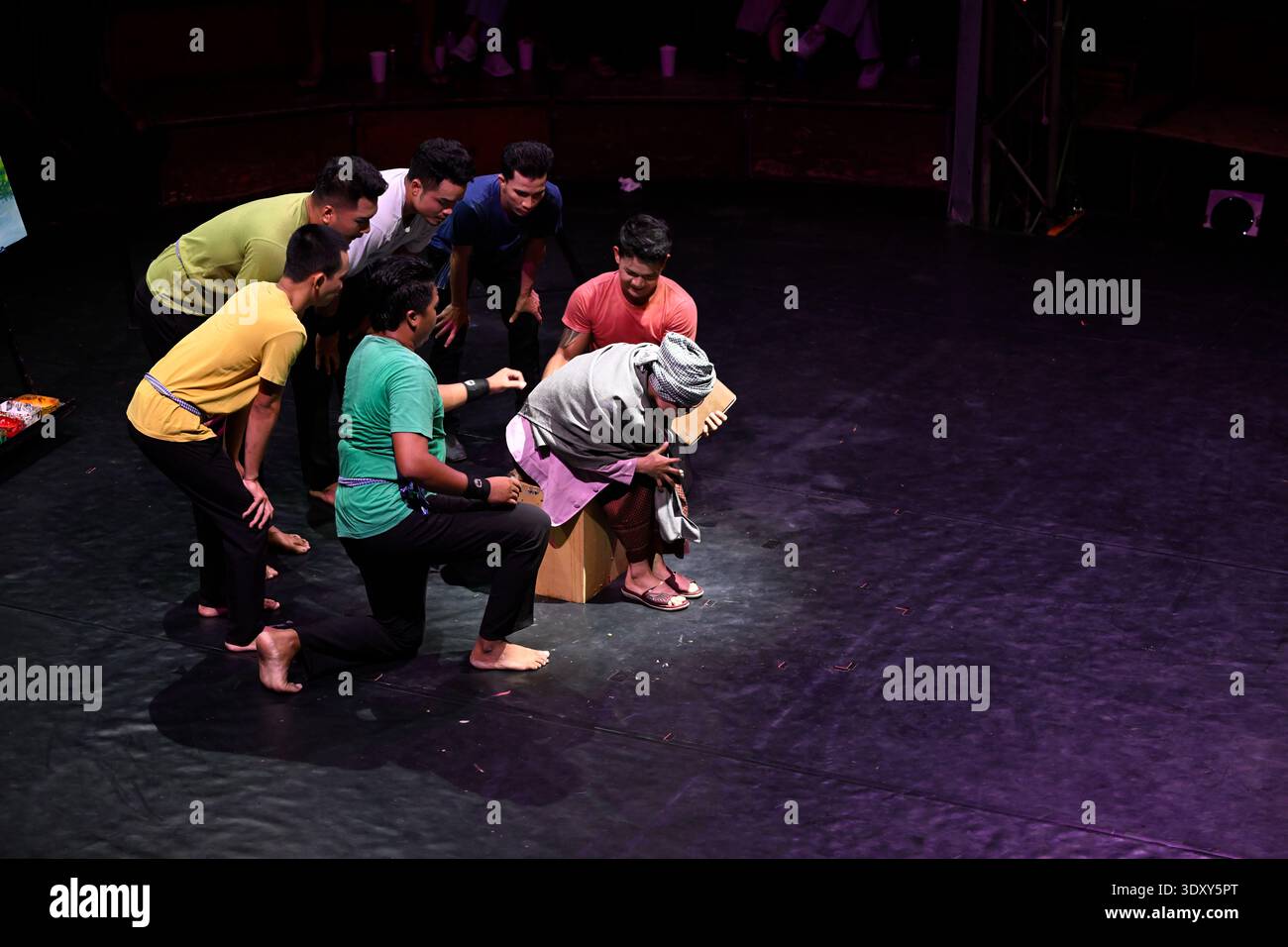 Members of the troop pay hommage to lead character Sokha during the Phare circus show of the same name in Siem Reap, Cambodia. Stock Photo